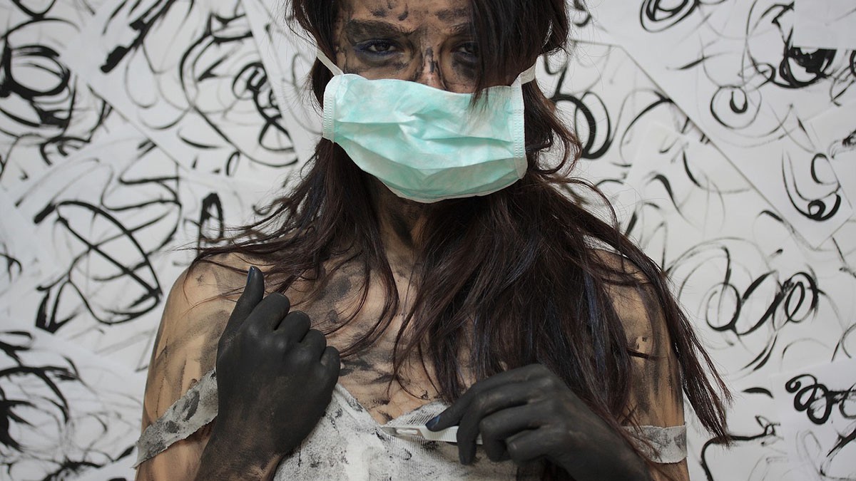 woman covered in soot